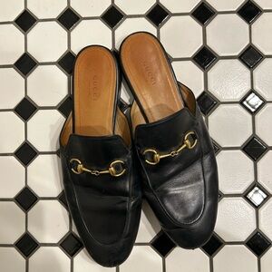 Gucci Black Leather Slides with Gold Accents